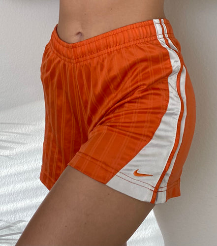 Orange Nike shorts